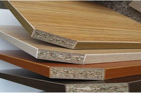 Prelaminated particle boards from wood and other Lignocellulosic material